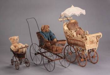 THREE WICKER DOLL CARRIAGES