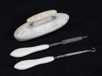 A SET OF THREE IVORY VANITY IMPLEMENTS