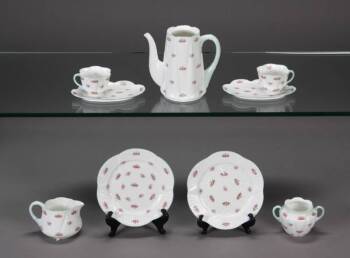 A PARTIAL PORCELAIN BREAKFAST SET