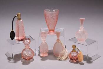 A GROUP OF PINK GLASS PERFUME BOTTLES