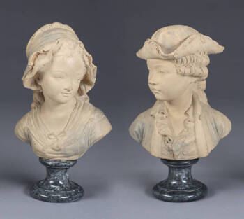 A PAIR OF TERRA COTTA BUSTS OF CHILDREN