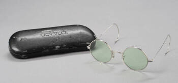 PAIR OF OZZY’S WIRE RIM GLASSES