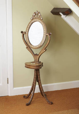 AN ANGLO-INDIAN IVORY AND HARDWOOD TOILET MIRROR