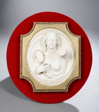 GILDED OVAL PLAQUE WITH MARBLE FIGURE