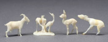 GROUP OF FOUR CHINESE CARVED IVORY ANIMALS