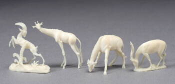 GROUP OF FOUR CHINESE CARVED IVORY ANIMALS