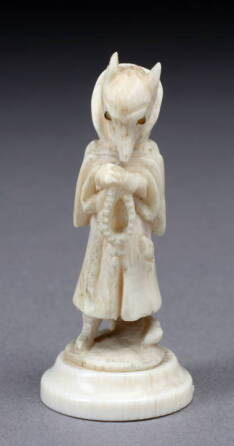 CHINESE CARVED IVORY FIGURINE