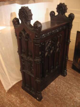 CHER - A PAIR OF GOTHIC REVIVAL OAK LECTERNS