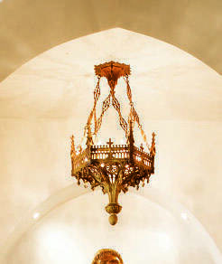 CHER - A GOTHIC REVIVAL GILT-METAL CHANDELIER