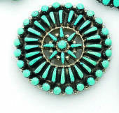 CHER - A TURQUOISE STONE BROOCH