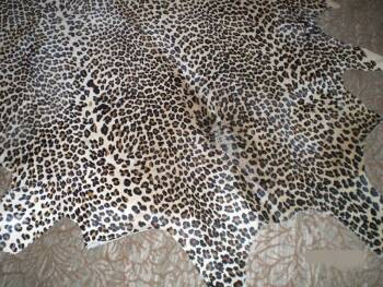 CHER - A FAUX LEOPARD-PRINTED HIDE RUG
