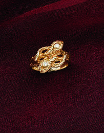 CHER - A GOLD AND DIAMOND SNAKE RING