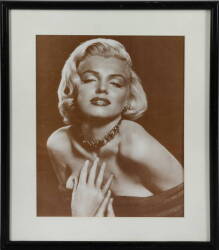 A GROUP OF FIVE FRAMED MARILYN MONROE POSTERS - 5