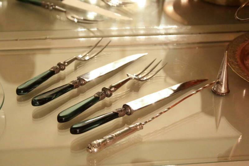 A SET OF THREE SERVING TRAYS WITH A SET OF FIVE CONDIMENT SERVERS