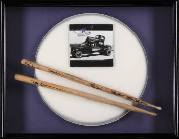 AEROSMITH SIGNED DRUMSTICKS AND SNARE DRUM HEAD