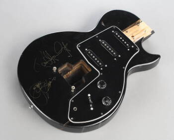 KISS - PAUL STANLEY AND GENE SIMMONS SIGNED SMASHE